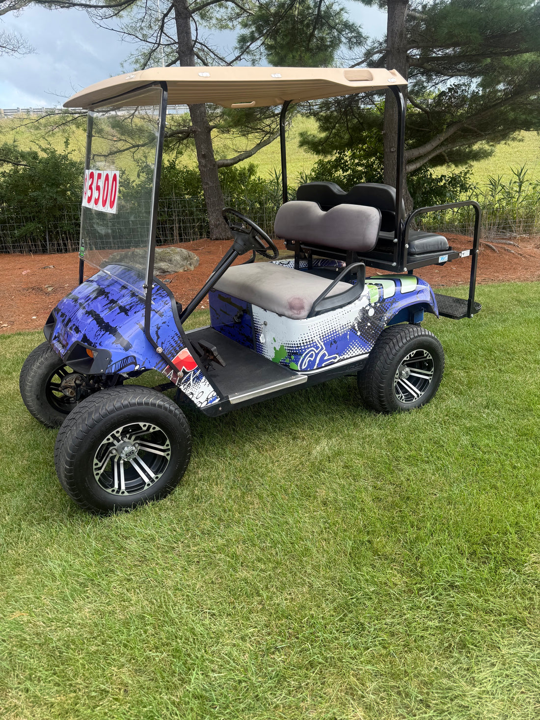 Ezgo Txt  Four Passenger Lifted  Electric Golf Cart