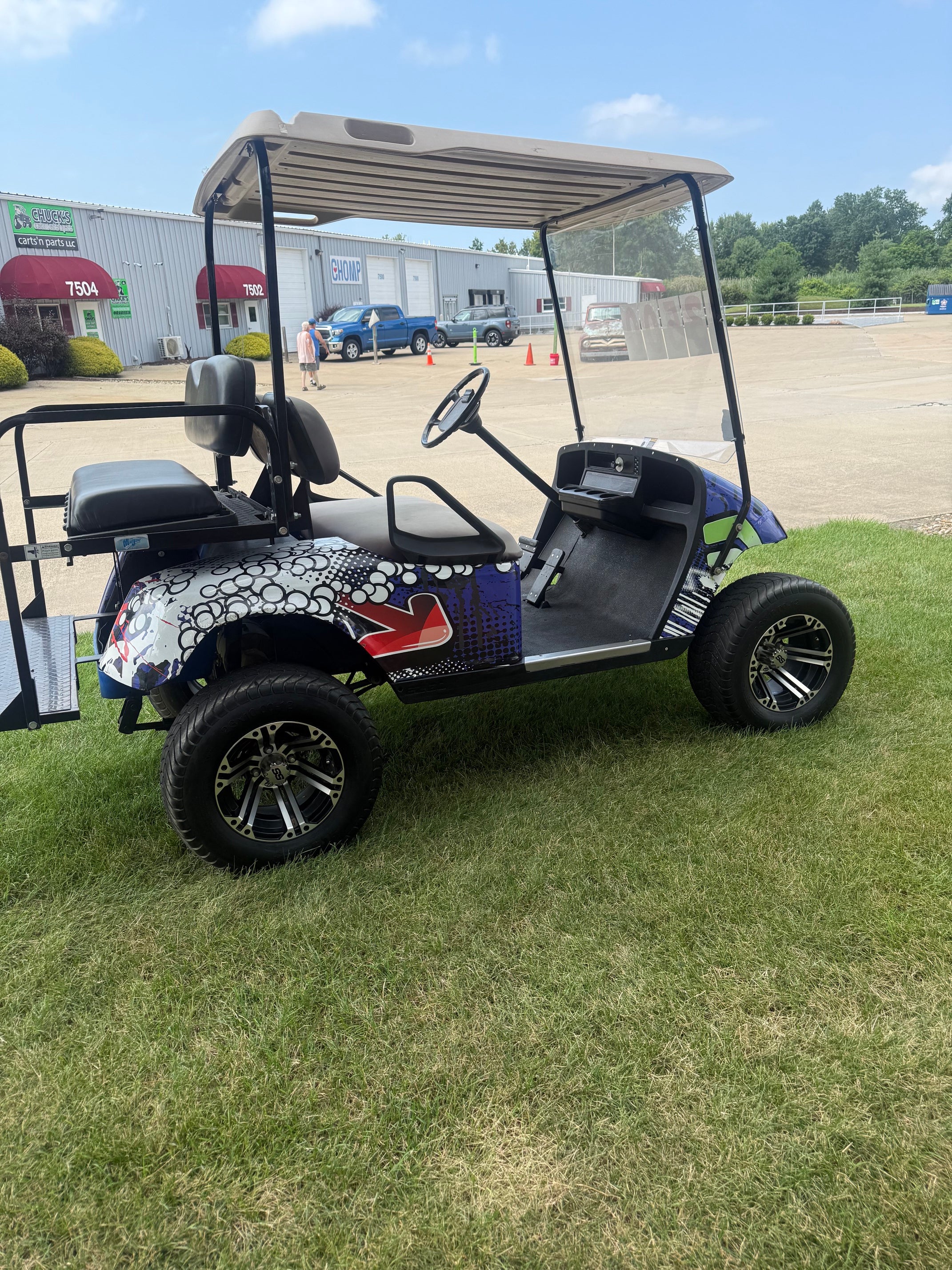 Ezgo Txt  Four Passenger Lifted  Electric Golf Cart